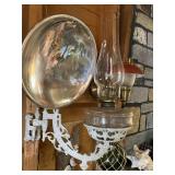 2 iron oil lamps, one with reflector