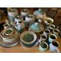 place settings , mugs, soup tureen, canister set, bowls, platters, and accessories