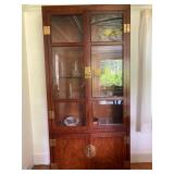 **3 lighted cabinets