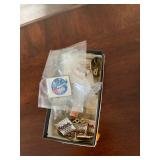 box of Kodak pins from different yrs