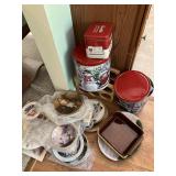 many collectible plates, tins