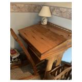 desk and caned rocker