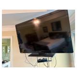 SEVERAL FLAT SCREEN TVs