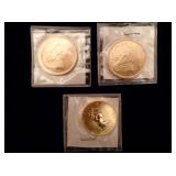 1984 gold Krugerrands and 1984 Maple Leaf $50 coin