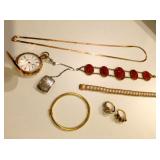 14K gold Elgin pocket watch, 14K gold chain necklace, 18K gold bangle, 14K carved carnelian bracelet