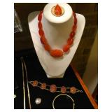 14K gold and carved carnelian necklace and bracelet. The buddha pendant is also carved carnelian and