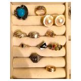 2 Sterling rings ( turquoise and at the bottom "Y" ring) the rest are all 14K gold and a couple are 