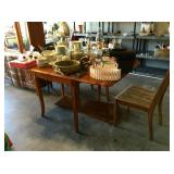 This table with 2 leaves and 4 chairs needs a little TLC, a great DIY project!