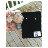 14K gold ladies watch, a Girard Perregaux watch, and a 14K white gold diamond earrings