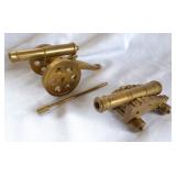 Miniature brass cannons