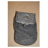 Vintage leather coin purse with metal clasp