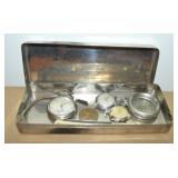 Collection of vintage watches in tin