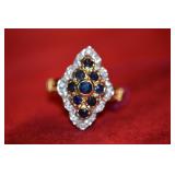 Cocktail ring with dark blue stones