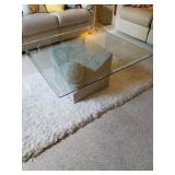 Coffee table sold rug still available