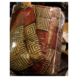 Queen bed in bag and have trash can and other bathroom accessories to match