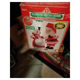 Plays "I say mama kissing Santa Claus he moves and light works