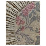 Quilted and Tasseled Ottoman 