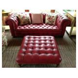 tufted red leather sofa and ottoman 