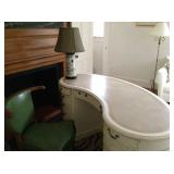 kidney shaped desk, leather armchair