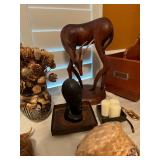 large carved wooden axis