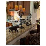 Lots of candles and holders