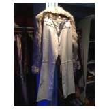 White leather pants and fur jacket