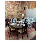 Queen Anne dining table with chairs, blue floral loveseat, Victorian chairs in red velvet
