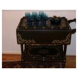 tea cart with trays. 
