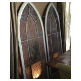 Pair of century old European stenciled glass arched church windows