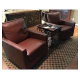 Pair of swivel rocker chairs