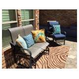 Outdoor furniture and decorative pillows..
