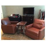 Pair of swivel rocker chairs