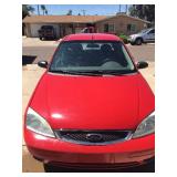 LIVE AUCTION! 2005 Red 4 Door Ford Focus, Grey Buick Lesabre and More!