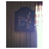 This piece of artwork opens to reveal a dartboard.