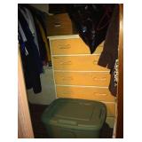 Five-drawer dresser being used in a closet.