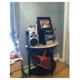 Marble-topped half-moon table.