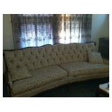 Paoletti yellow brocade curved sofa