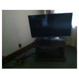 Flat-screen TV and stand