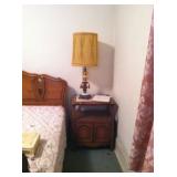 Nightstand with amber pendant lamps