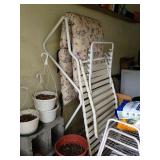 Chaise lounge with cushion.