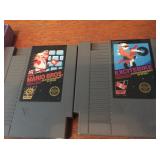 Super Mario Bros. and Excitebike for the NES, no boxes.