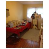 Four tables of sports cards and collectibles