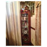 Full-to-bursting corner curio cabinet