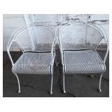 Vintage metal patio chairs with flower detail on top rail