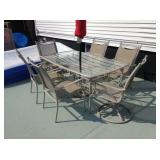 Patio set for six with umbrella.