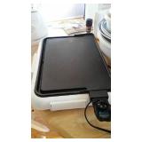 Portable electric griddle.