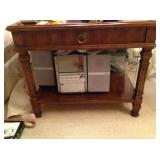 End table with Panasonic portable stereo with 5-CD changer.