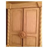 Armoire too big to fit in the frame, goes with bedroom set.