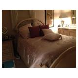 Beautiful bed with headboard and footboard.