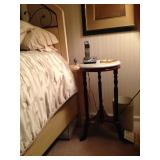 Little stone-topped table.